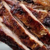 Kenyan Spice Rub Smoked Pork Ribs · Dry rubbed in authentic Kenyan spices and smoked until tender and tasty.