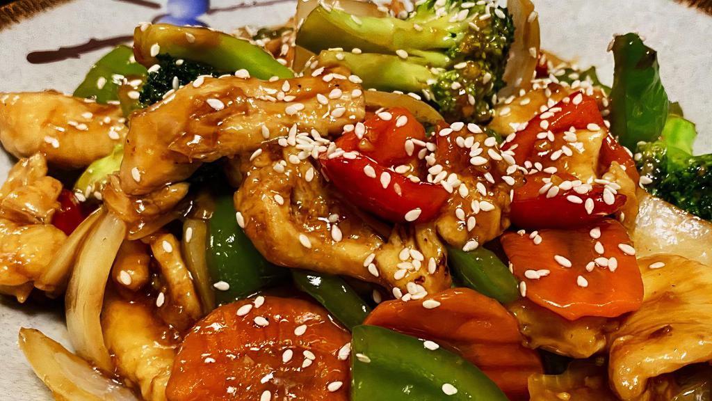 Stir Fry Teriyaki Chicken Bowl · Green & red bell pepper, carrots, broccoli with chicken stir fry in sweet & gingery teriyaki sauce.