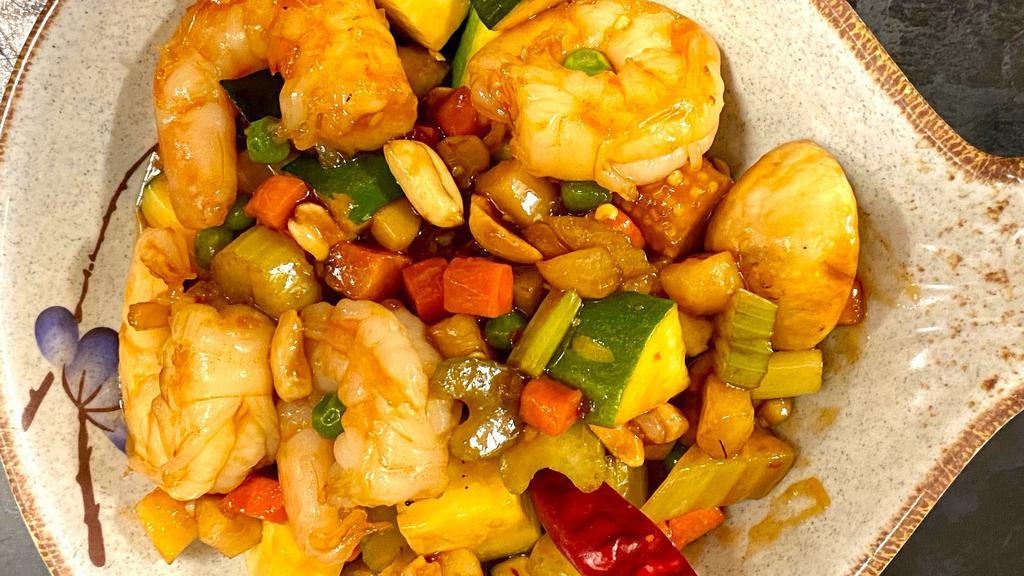 Kung Pao Shrimp · Spicy.  Diced vegetables and peanuts sautéed with Shrimp in hot garlic sauce.