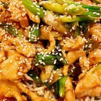 Sesame Chicken Or Beef · Spicy. Chicken or beef sautéed with green onion in garlic and chili topped with sesame seeds.