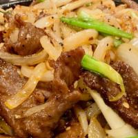 Sizzling Beef Strip Loin · Spicy. Sliced tender beef sautéed with green and white onion in pepper and garlic sauce.