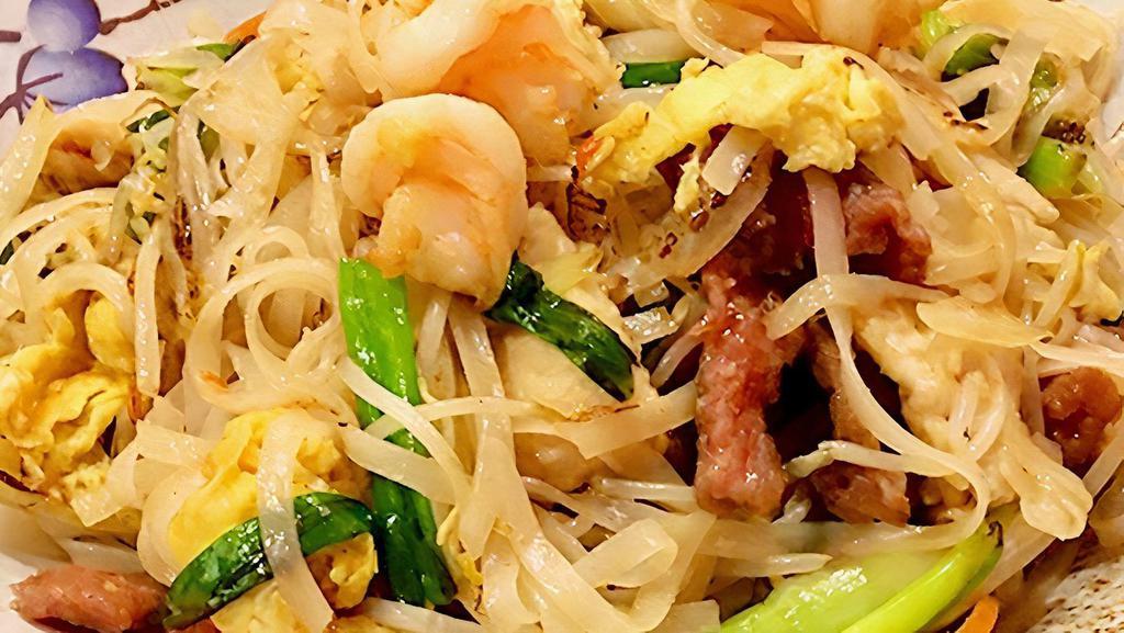Pad Thai · Spicy. Stir fried rice noodles with bean sprouts, scallions and egg with chicken, beef and shrimp.