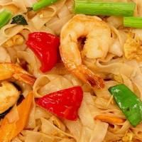 Drunken Noodles · Spicy. Flat rice noodles with egg, bamboo, tomatoes, onions, red and green peppers, basil, c...
