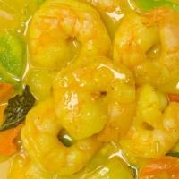 Yellow Curry With Shrimp · Spicy. Green and red bell pepper, peas and carrots, bamboo and basil in yellow curry sauce w...