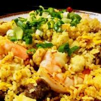Indonesia Fried Rice · Favorite. Spicy. Indonesia spicy fried rice with chicken, beef and shrimp. (with Peanut)
