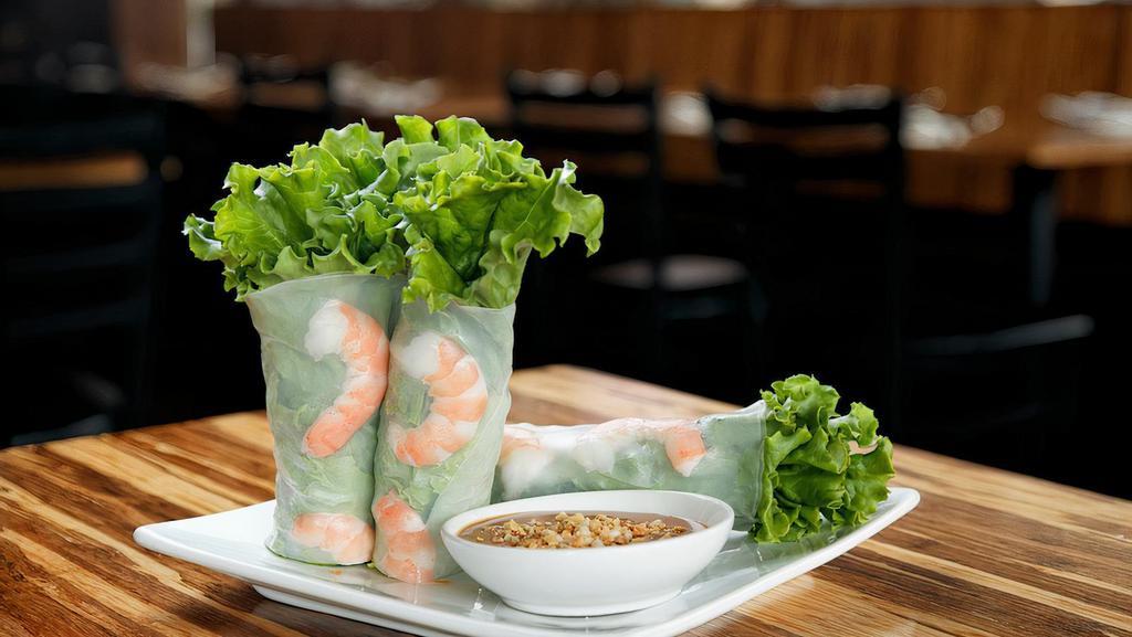 Shrimp Salad Rolls · Shrimp wrapped in rice paper and lettuce rolls with noodles, carrots, basil and beansprout. Served with a side of homemade peanut sauce.