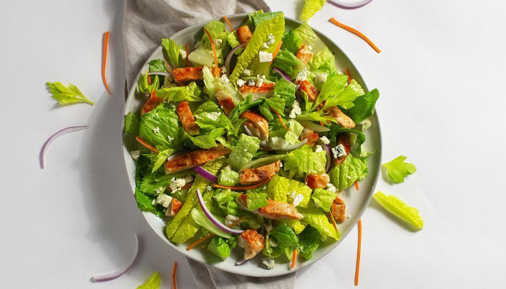 Buffalo Chicken Salad · Buffalo chicken, celery, red onion, shredded carrots, and blue cheese with your choice of greens and dressing.