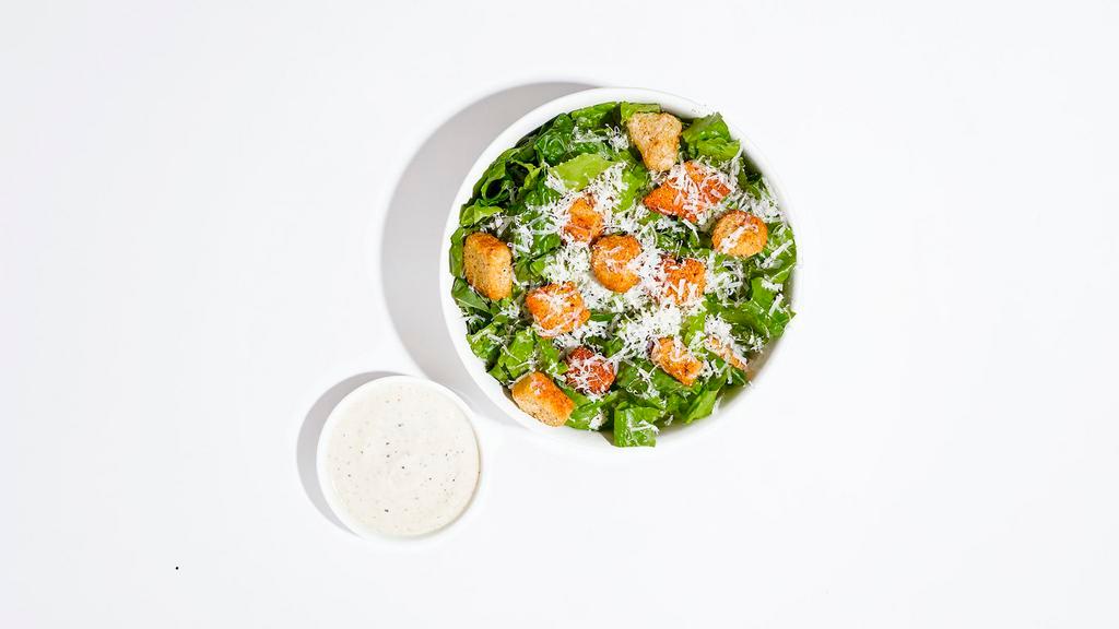 Caesar Salad · Romaine lettuce, parmesan cheese, and croutons with caesar dressing.