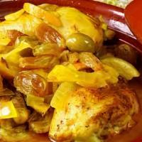 Tagine Of Chicken Lemon And Olives A La Carte · Braised chicken served with preserved lemon sauce & olives.