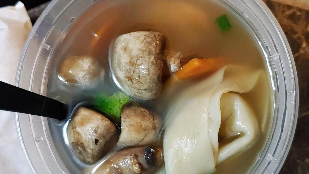 Wonton Soup · Chicken stuffed wontons in clear broth with vegetables and two shrimps.