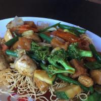 Pan Fried Crispy Noodles · Not served with rice. Served with carrots, broccoli, mushrooms and snow peas in a brown oyst...
