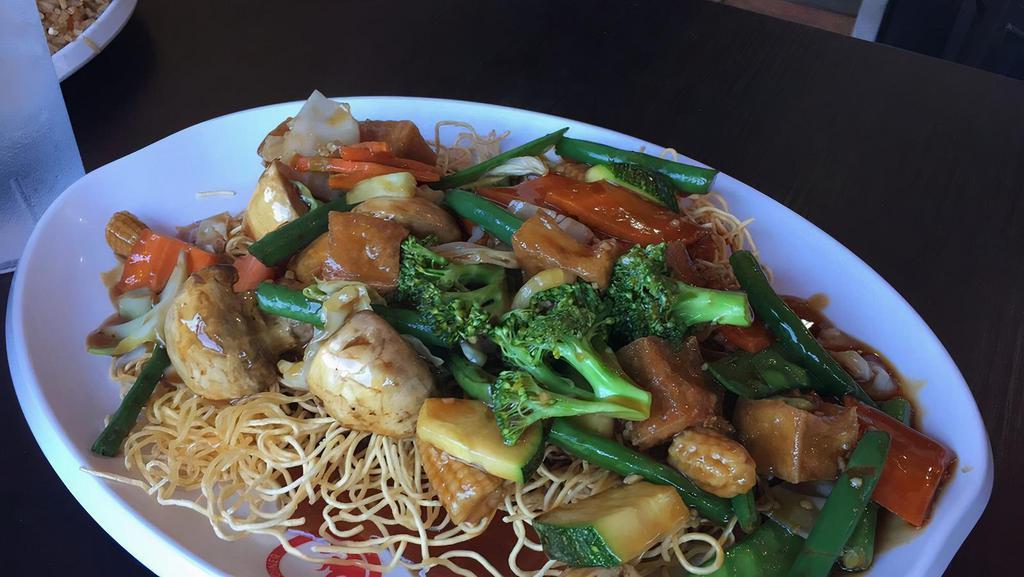 Pan Fried Crispy Noodles · Not served with rice. Served with carrots, broccoli, mushrooms and snow peas in a brown oyster sauce.