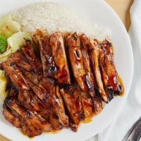 Teriyaki Chicken · Grilled boneless chicken marinated in sauce. Served with steamed rice and stir-fried vegetab...