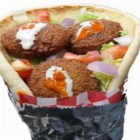 Falafel Gyro · Falafel and pita bread with lettuce, tomatoes, pickles and tahini sauce.