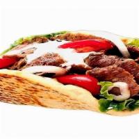 Beef Gyro · Shredded beef, tahini sauce, onion, lettuce, parsley, tomato and pickles double.