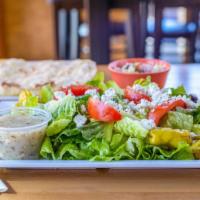 Mediterranean Salad · Lettuce, tomato wedges, feta, kalamata olives, and pepperoncinis. Served with dressing. Gree...