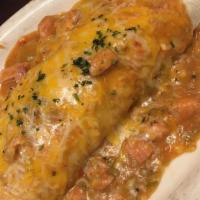 Huge Smothered Breakfast Burrito · Eggs, potatoes and cheese smothered in your choice of chili with your choice of meat.