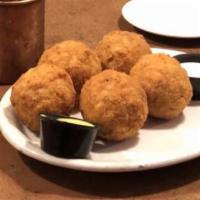 Mac & Cheese Balls · Five large balls of homemade mac and cheese, rolled in seasoned panko breading with crispy b...