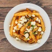 House Greek Fries · Crispy, hot, and delicious fries topped with feta cheese, and special casa dressing mix.