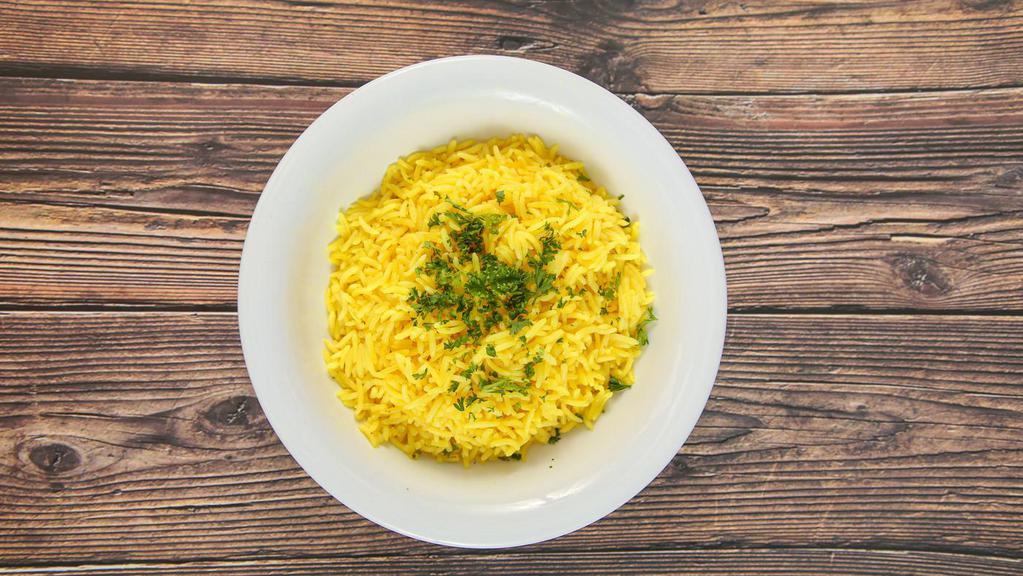 Side Rice · Basmati rice with special seasoning and turmeric.
