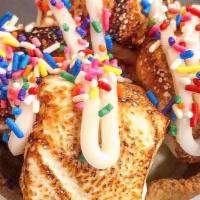 Birthday Cake · Toasted vanilla bean marshmallows in a graham cracker bowl topped with vanilla bean frosting...