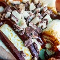 The Grasshopper · S'more is made with mint marshmallows toasted in a graham cracker bowl and topped with choco...