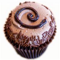 Triple Chocolate · Rich chocolate cake, chocolate buttercream with Ghirardelli fudge drizzle and rolled in choc...
