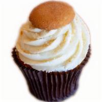 Banana Cream · Banana cake filled with handmade marshmallow fluff and topped with our handmade vanilla butt...