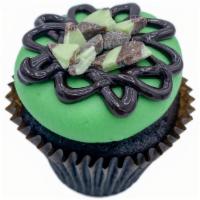 Mint Chocolate · Rich Devils food cake topped with a sweet mint buttercream, finished with andes mint candies.