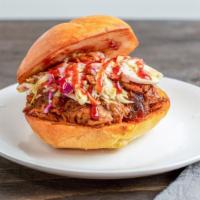 Mega Bbq Pork Bomb · House made, slow-roasted pork with BBQ sauce, coleslaw, and dill pickle on brioche