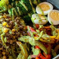 Spanish Power Bowl · Quinoa, lentils, steamed broccoli, baby lima beans, fresh corn kernels, roasted bell peppers...