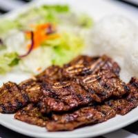 Beef Short Ribs · Served with rice, salad and teriyaki sauce