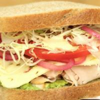 Baja Chipotle Turkey · 630-700 cal. Turkey breast layered with shaved cabbage, pickled red onions, tomato, avocado,...