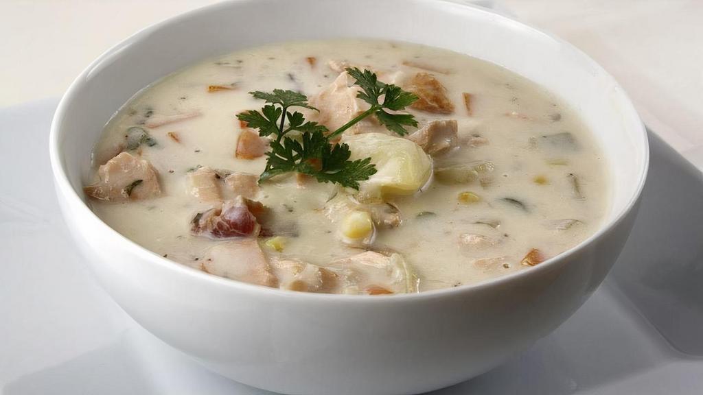 Smoked Salmon Chowder · Applewood smoked salmon in a traditional New England cream chowder is now a Traditional Oregon chowder!  Onions, celery, potatoes, cream, fresh herbs & spices
