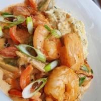 Southern Gulf Shrimp & Grits · Gulf shrimp sauteed w/ red & green peppers, onion, mushroom & creamy Cajun sauce.  Served w/...
