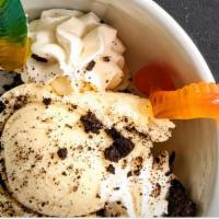 Dirt & Worms · vanilla ice cream w/ gummy worms, Oreo cookie crumbs, chocolate sauce and whipped cream
