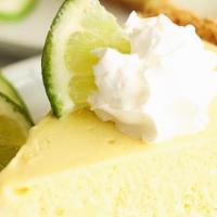 Key Lime Pie · Traditional Southern recipe w/ real Key lime, Graham cracker crust, brandy raspberry sauce &...
