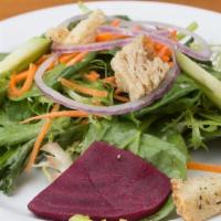 Seasonal Greens Salad · With spiced fresh beets, carrots, red onion, cucumbers and garlic croutons