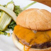 Kid'S Cheeseburger · Cascade natural beef, Brioche bun, cheddar cheese, lettuce, pickles and chips