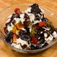 Dirt & Worms · vanilla ice cream w/ gummy worms, Oreo cookie crumbs, chocolate sauce and whipped cream
