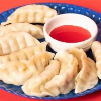 Potstickers (6) · It’s more than just a warm feeling inside. Deep-fried chicken potstickers with soy vinaigret...