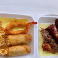 Pu Pu Platter · Spring (2), egg roll (2), wing (2), fries fish (1), cheese wonton (2), and fried shrimp (2).