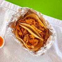 Chorizo Taco (1) · Served in freshly prepared corn shells, filled with generous portions of seasoned meat, lett...