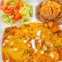 Chicken Enchiladas Dinner · Includes beans, rice and salad.