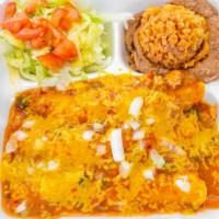 Cheese Enchiladas · Three corn tortillas wrapped. smothered with chili and topped with cheddar cheese.