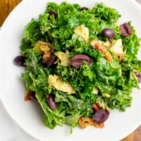 The Kale · Vegan. Green curly kale, kalamata olives, artichoke hearts, sun dried tomatoes, cashew dress...
