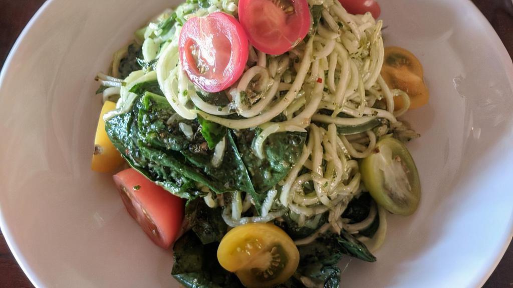 Piastra · Vegan. Chilled zucchini noodles, house-made pesto, heirloom cherry tomatoes, spinach.