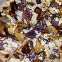 Arrosto · No sauce. Feta, eggplant, purple & yukon gold potatoes, dates, white truffle oil.