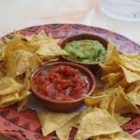 Chips And Salsa · Tortilla chips with roasted tomato salsa
