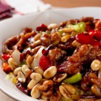Kung Pao Beef · Hot and spicy. Deep fried beef prepared with garlic, onions and chili pepper sauce.
